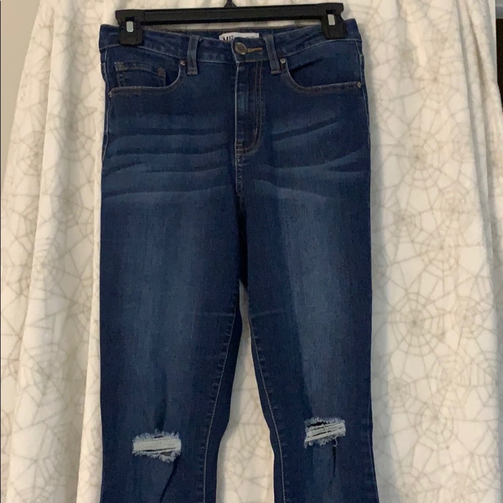Ripped Frayed bell bottom jeans